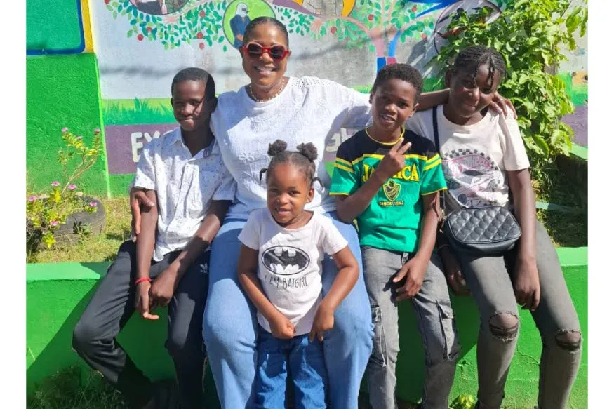 Minister Wilma Johnson with children at the NFCM Cornwall Mountain outreach.