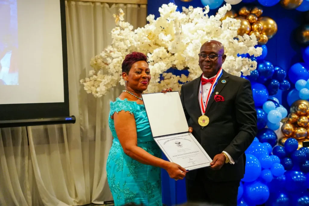 Bishop Donald Washington McFarlane receives a Lifetime Achievement Award at the NFCM 40th anniversary banquet.